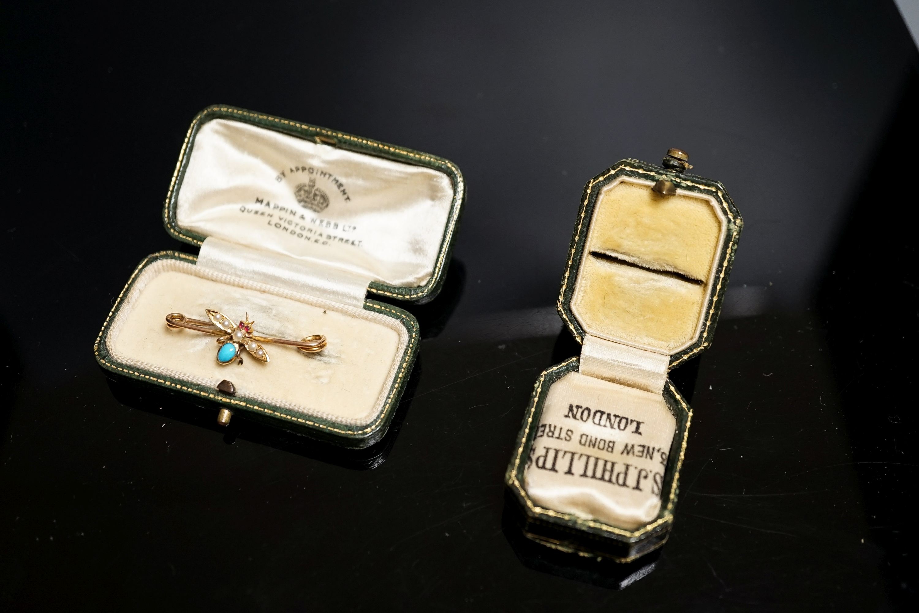 An Edwardian yellow metal and gem set bee brooch, 32mm and an SJ Philips ring box.